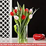 Red & Pink Tulips in Glass Vase
