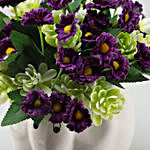 Artificial Purple Daisies In Elephant Pot