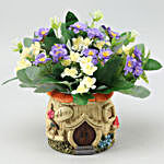 Artificial White & Blue Flowers In Resin Pot