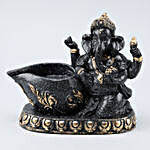 Lord Ganesha Idol With Diya