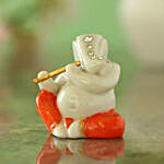 Serene Flute Playing Ganesha Idol- Orange & White