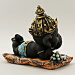 Cute Matte Black Resting Bal Ganesha Idol