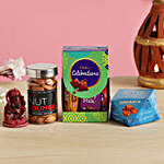 Diwali Sweets With Red Ganesha Idol & Almonds