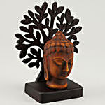 Calm Face Of Buddha Idol Under A Tree