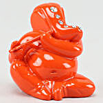 Orange Flute Ganesha Idol & Ferrero Rocher Combo