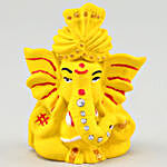 Chocolates With Matte Yellow Ganesha Idol