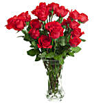 Sensuous Red Roses In A Glass Vase