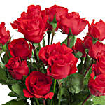 Sensuous Red Roses In A Glass Vase