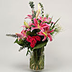 Gorgeous Flowers In Cylindrical Vase