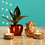 Beige Ganesha Idol & Candles With Sansevieria Plant