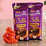 Dairy Milk Silk Hazelnut Chocolates & Orange Ganesha Idol Combo
