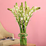 15 White Tube Roses In Cylindrical Vase