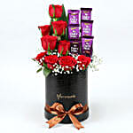 Red Roses & Dairy Milk Arrangement In Round FNP Box