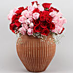 Aqua And Red Roses Arrangement In Terracotta Pot