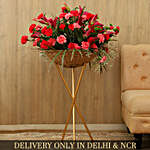 Elegant Bunch Of Flowers In Basket With Iron Stand