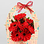 Red Gerberas In FNP Love Sleeve