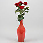 Beautiful Red Roses In Peach Glass Vase