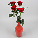 Beautiful Red Roses In Peach Glass Vase