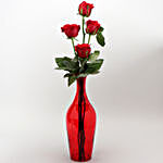 Beautiful Red Roses In Red Glass Vase
