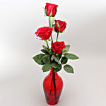 Beautiful Red Roses In Red Glass Vase