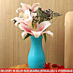 Pink Oriental Lilies In Blue Glass Vase