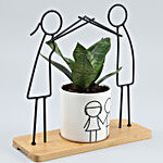 Sansevieria Plant With Cute Boy & Girl Figurine