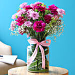 Colourful Mixed Flowers In Pink Ribbon Tied Jar