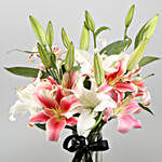 Mixed Oriental Lilies In Cylindrical Vase