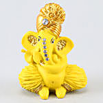 4 Tealight Diyas & Ganesha Idol With Soan Papdi