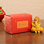 Yellow Ganesha Idol & Rajbhog Tin
