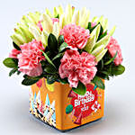 Pink Carnations & White Lilies In Orange Birthday Vase