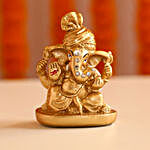Ganesha Idol With Diyas N Besan Laddoos
