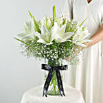 Blooming Asiatic Lilies In Black Ribbon Tied Vase