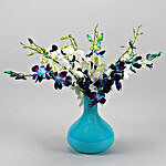 Blue & White Orchids In Blue Glass Vase