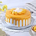 Dripping Mango Cream Cake Eggless
