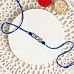 Minimalistic Navy Evil  Eye Rakhi & Butterscotch Delight Half Kg