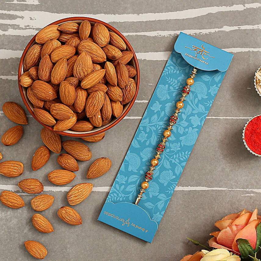 Traditional Golden Pearl Rakhi And Healthy Almonds:Send Rakhi to Saudi Arabia