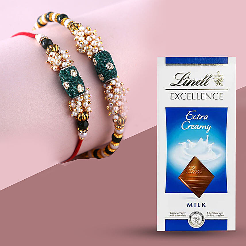 Sneh Classy Green Pearl Rakhis And Lindt Excellence Extra Creamy Milk Chocolate Bar