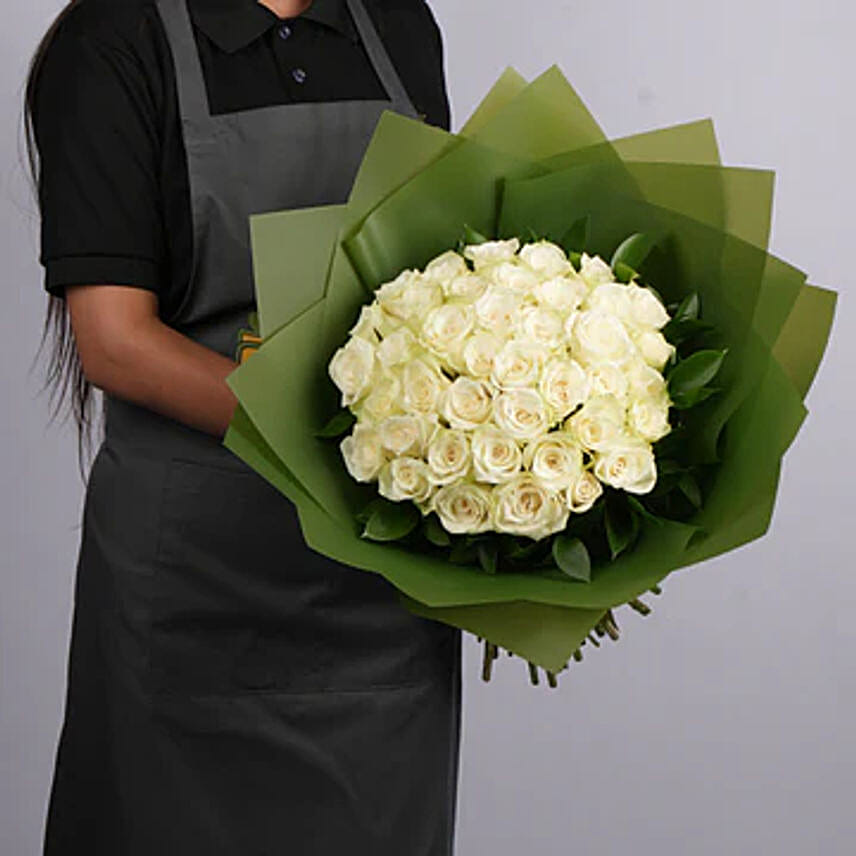 White Roses Bouquet Beautiful in Green Wrapping