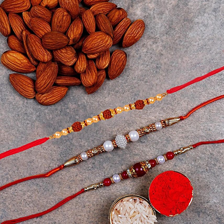 Almonds And 3 Designer Rakhis:Rakhi With Dry Fruits to Singapore