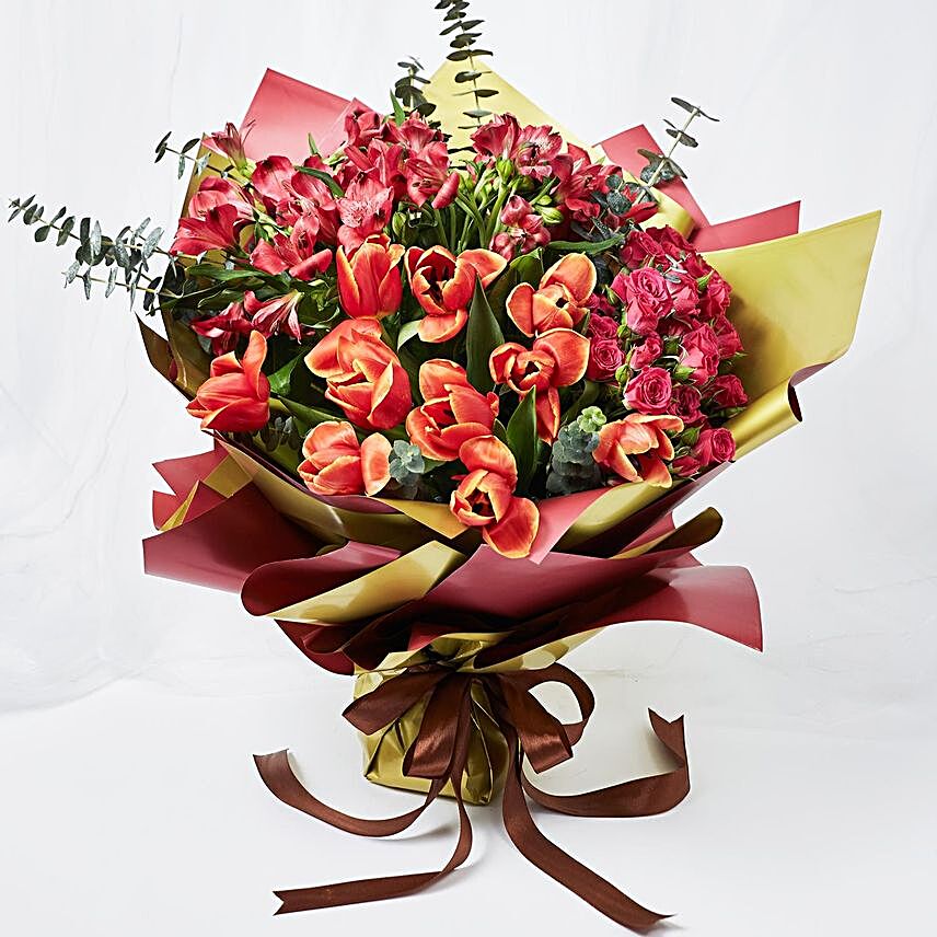 Lovely Mixed Flowers Wrapped Bouquet:Tulips to Singapore