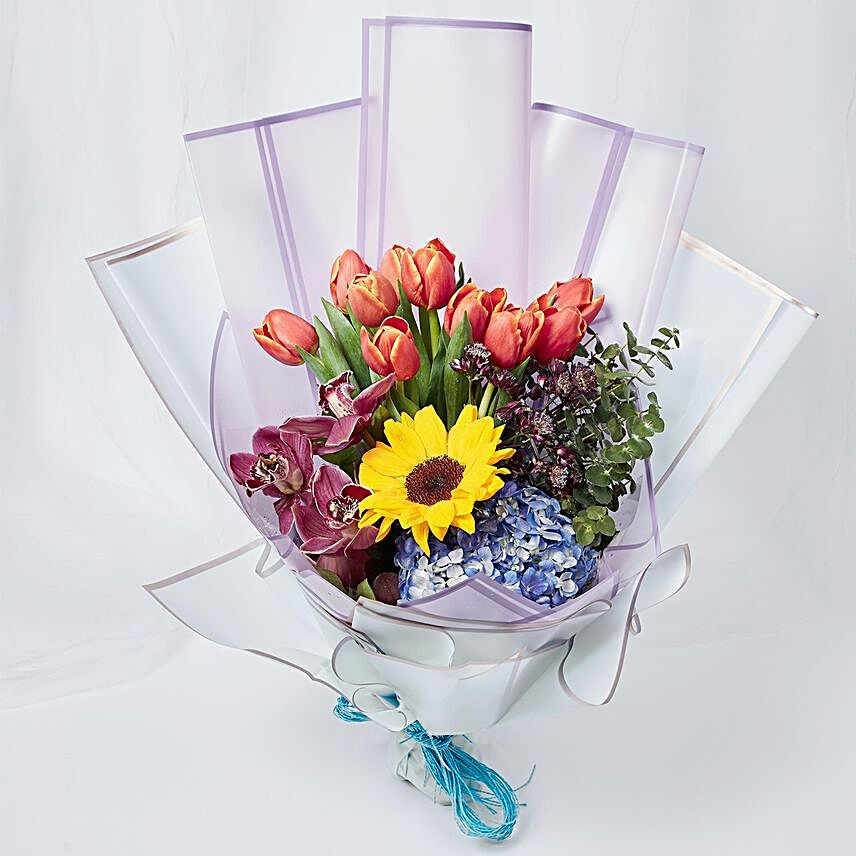 Vibrant Mixed Flowers Wrapped Bouquet:Tulips