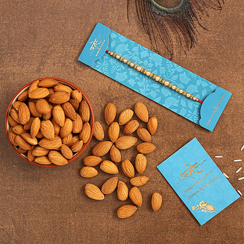 Traditional Pearl Mauli Rakhi And Healthy Almonds:Rakhi Delivery in Singapore