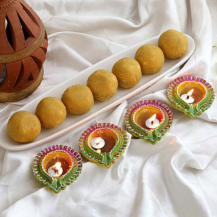 Floral Diyas With Besan Laddoo:Sweets to Singapore