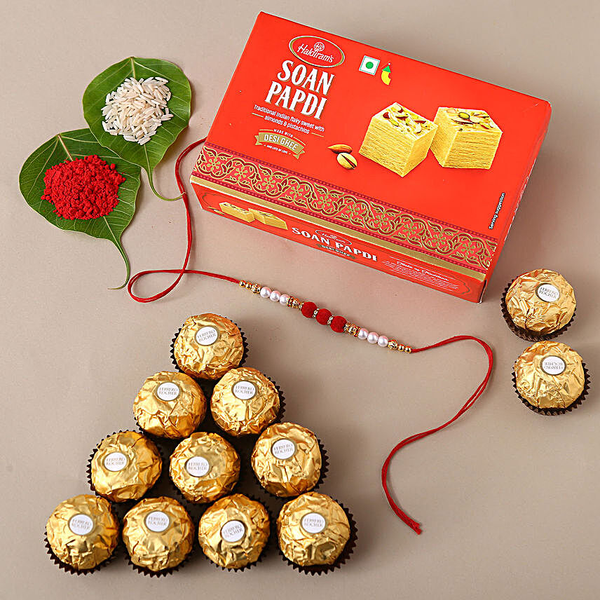 Sneh Red White Pearl Rakhi & Ferrero Rcoher:Single Rakhi to Singapore