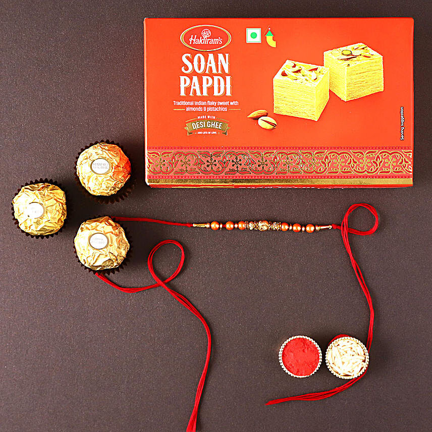 Sneh Minimalist Rakhi With Soan Papdi & Ferrero Rocher:Rakhi and Sweets to Singapore