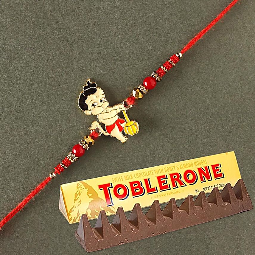 Sneh Holy Ganesha Kids Rakhi with Toblerone:Rakhi with Chocolates to Singapore