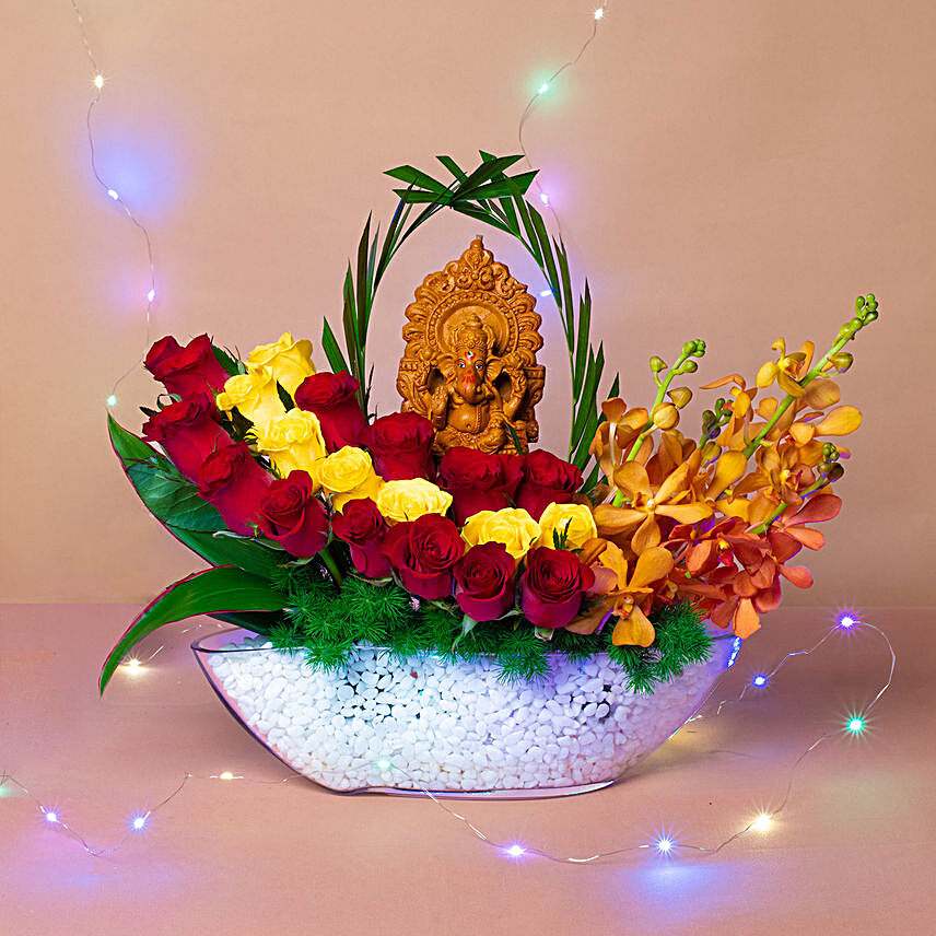 Colourful Flowers N Ganesha Idol Ship Shaped Vase:Diwali Gifts to Singapore