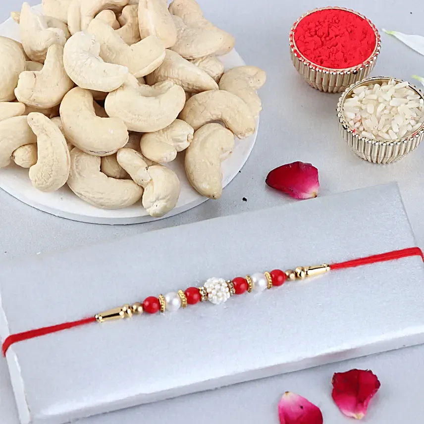 Sneh Nityam Creation Regular Ethnic Pearl Rakhi with Cashews