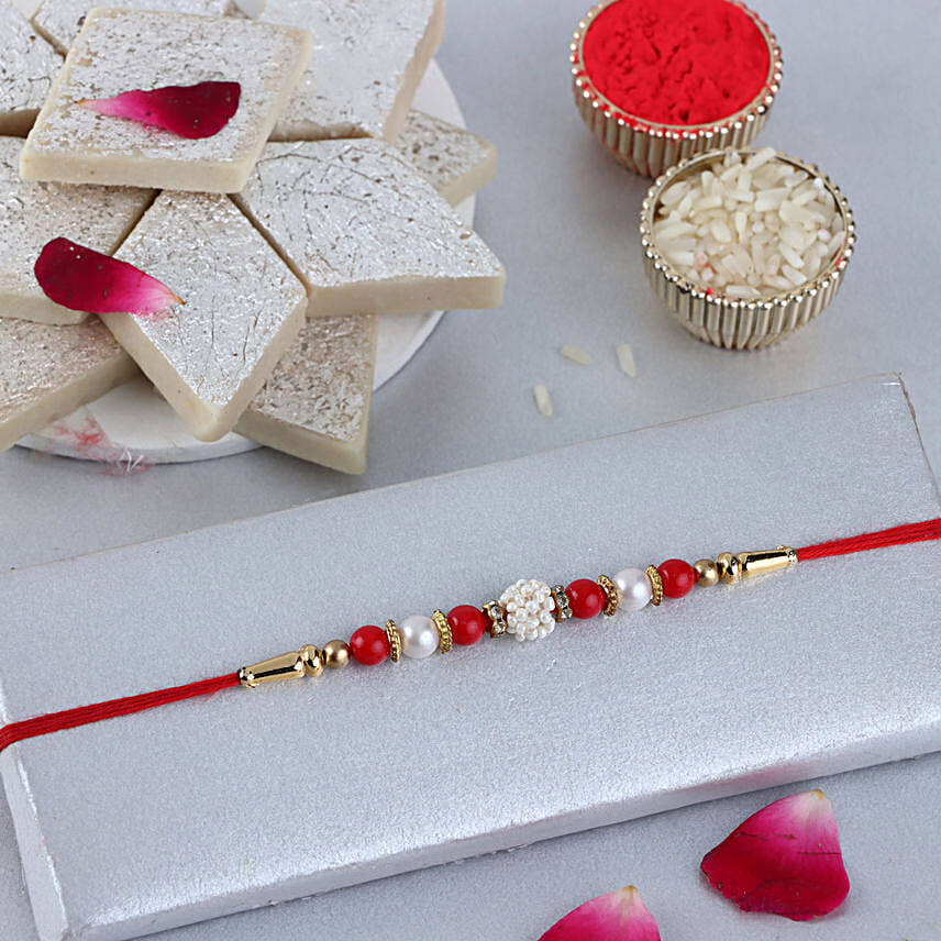 Sneh Nityam Creation Regular Ethnic Pearl Rakhi with Kaju Katli